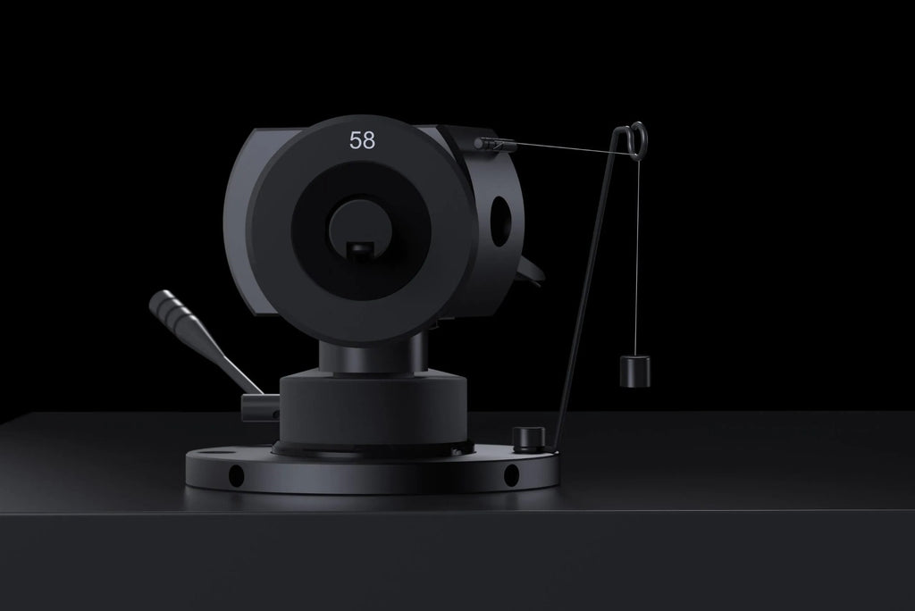 Pro-Ject Debut Pro S turntable in Satin Black showing VTA setting adjustment with tonearm and platter visible.