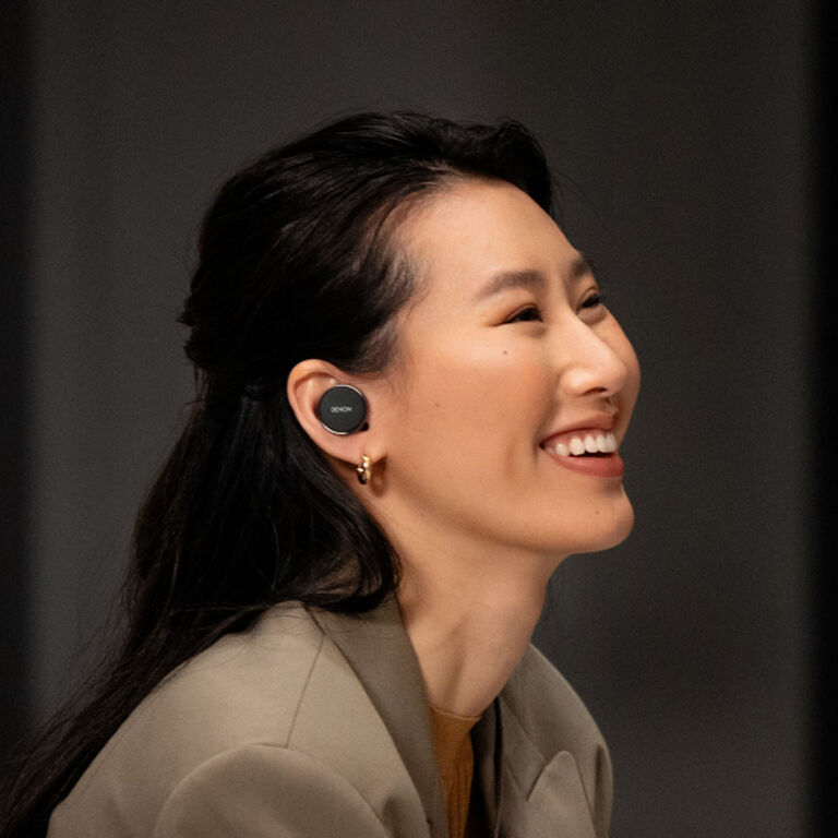 Denon PerL wireless in-ear headphones, lifestyle, worn