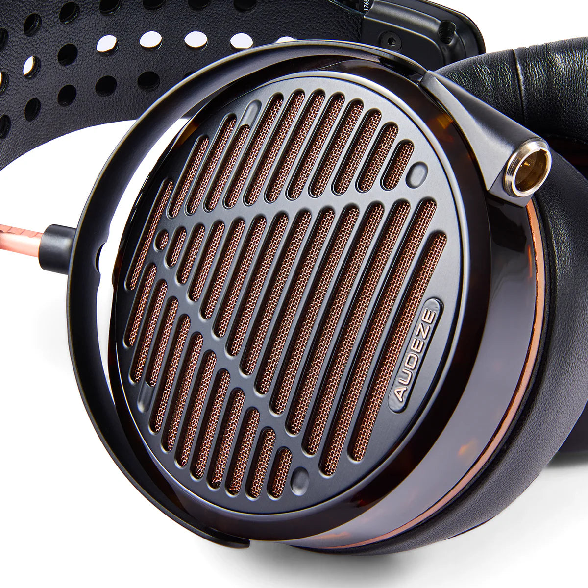 Audeze LCD-5 wired headphones with large ear cups and headband, featuring sleek black design and high-quality audio components.