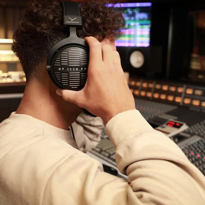 Beyerdynamic DT 1990 Pro MK2 open-back studio headphones, black with silver accents, featuring large ear cups and adjustable headband.