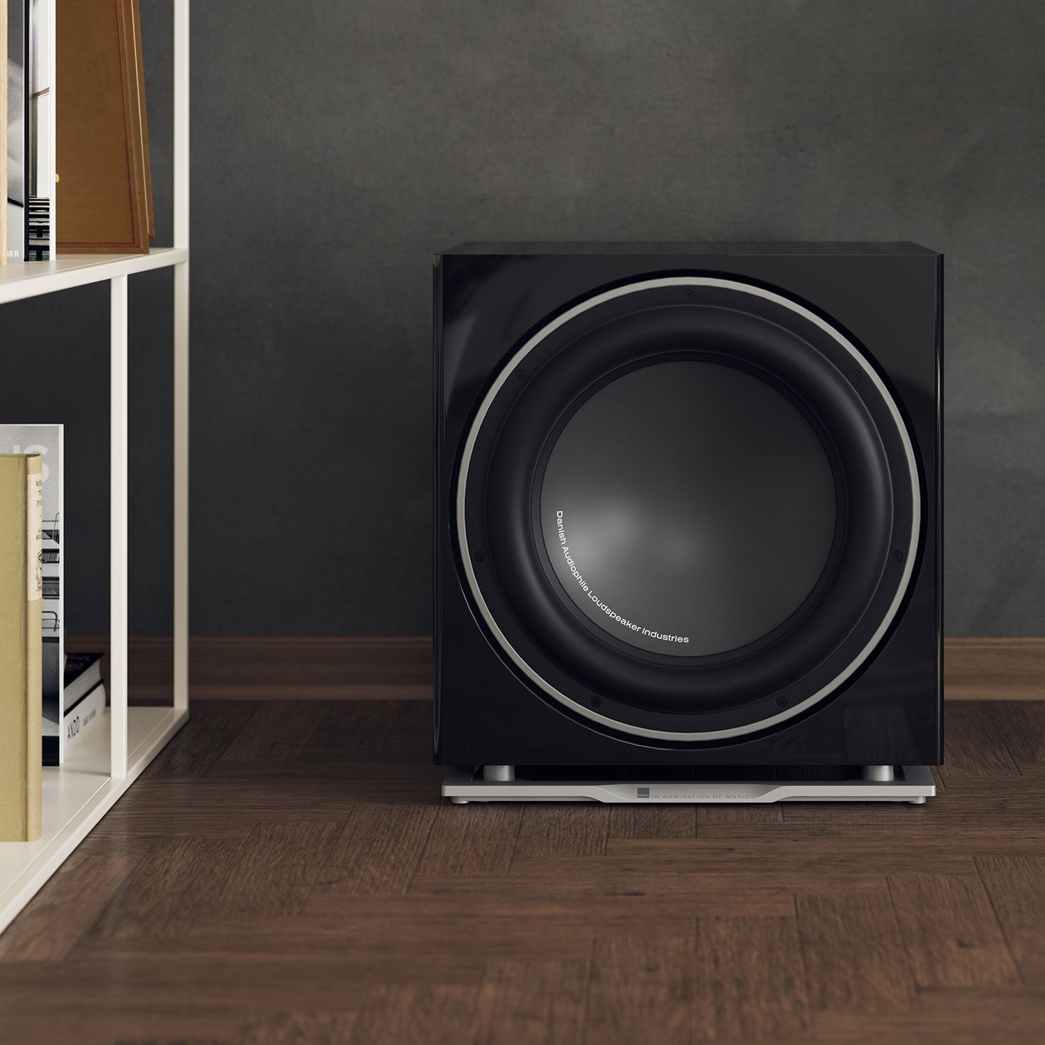 DALI Dali Sub K-14 F subwoofer with sleek black enclosure and driver visible, designed for deep bass in home audio systems.