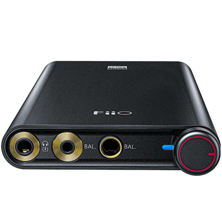 FiiO Q3 headphone amplifier and DAC featuring a sleek design and multiple input options for enhanced audio quality.