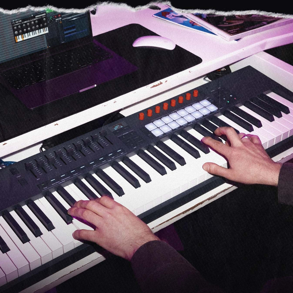 Novation FLkey 2 61 MIDI keyboard with illuminated pads and control knobs, shown in a music production setup.