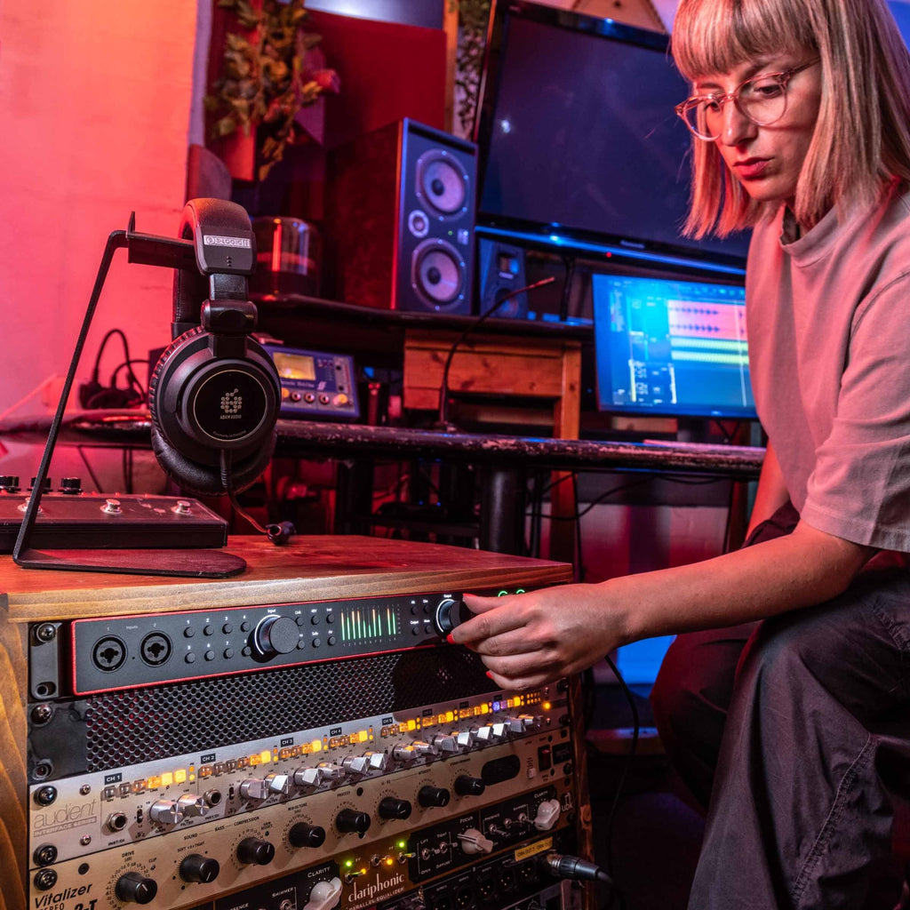 Focusrite Scarlett 18i20 4th Gen audio interface, lifestyle at studio desk