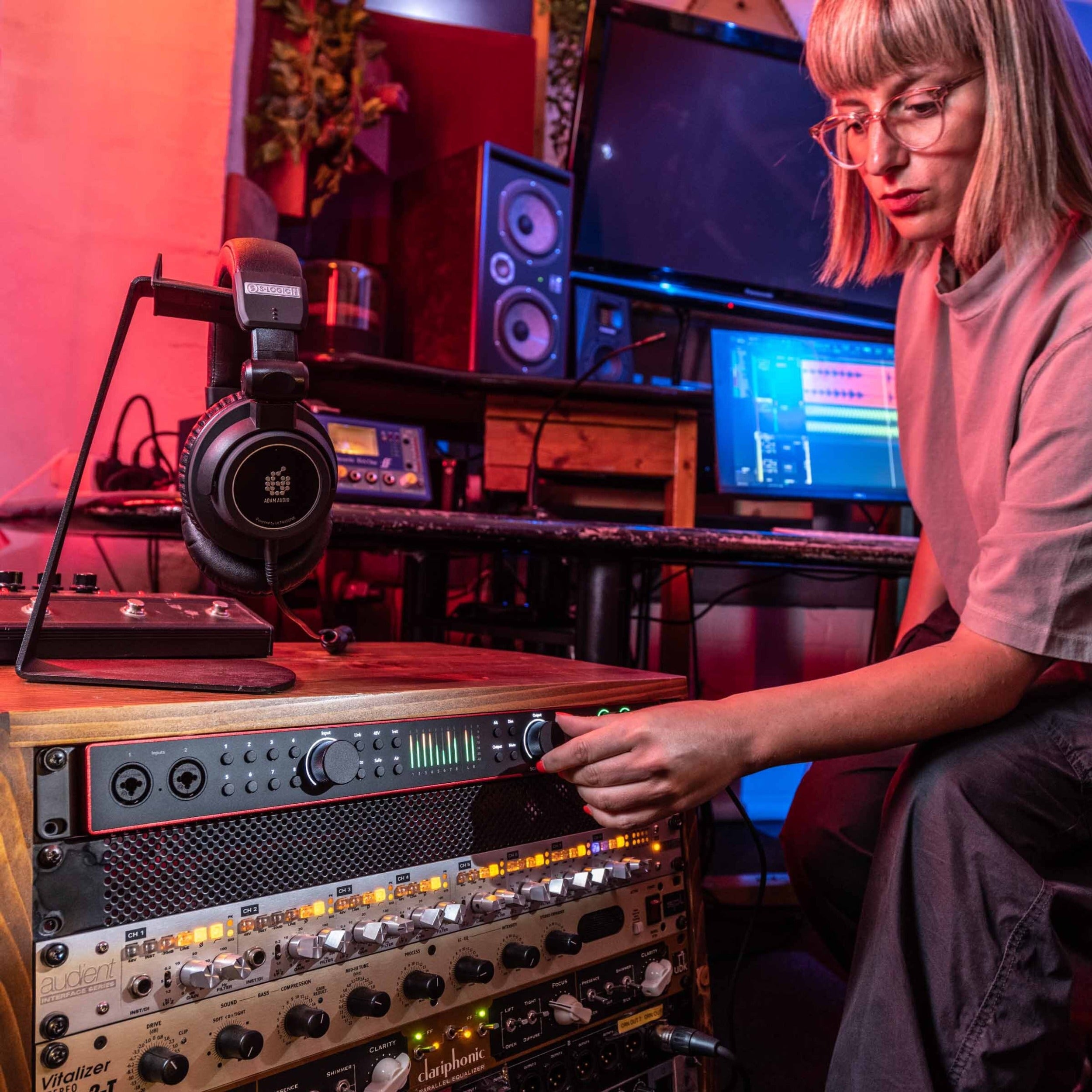 Focusrite Scarlett 18i20 4th Gen audio interface, lifestyle at studio desk