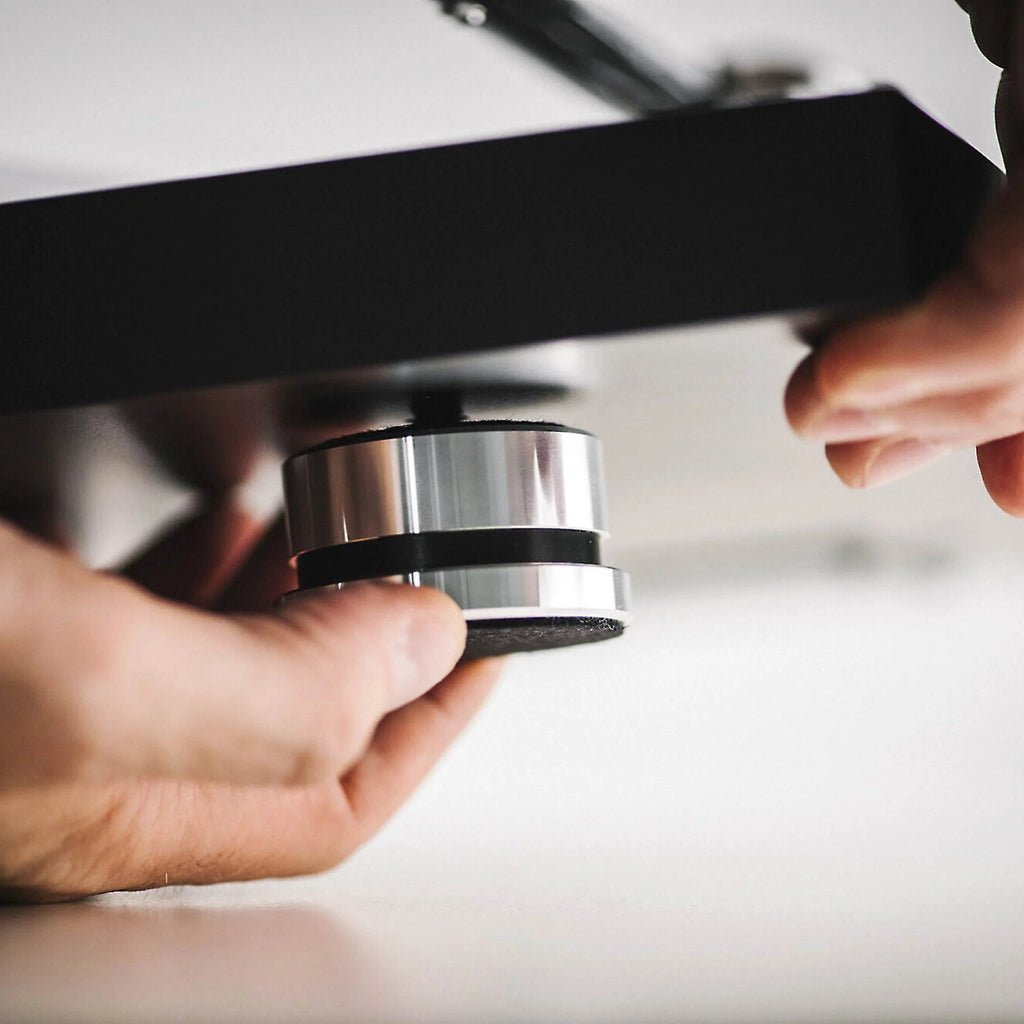 Pro-Ject Debut Reference 10 manual turntable with sleek design and tonearm, ideal for high-quality vinyl playback.