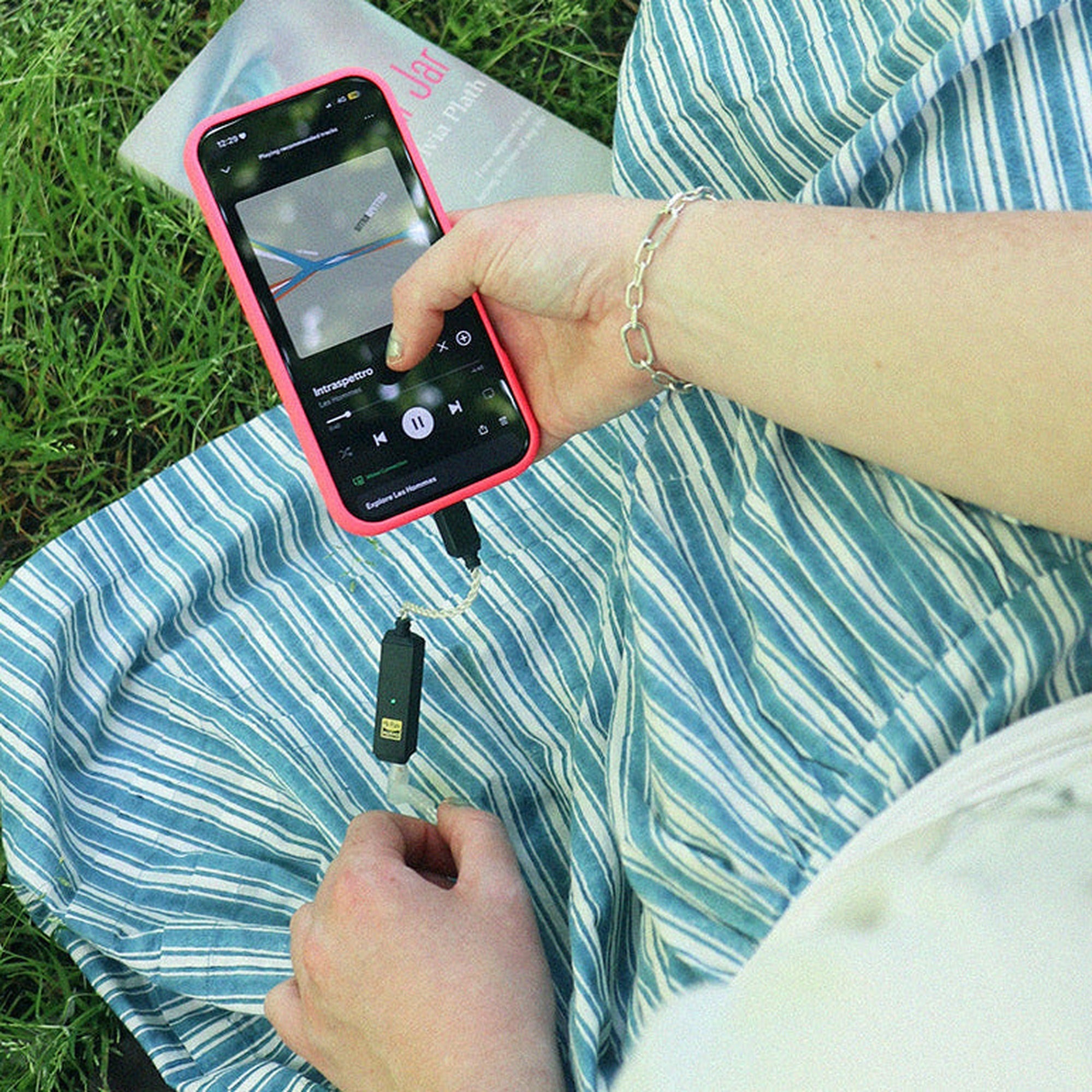 iFi Audio GO link 2 Max held in hand