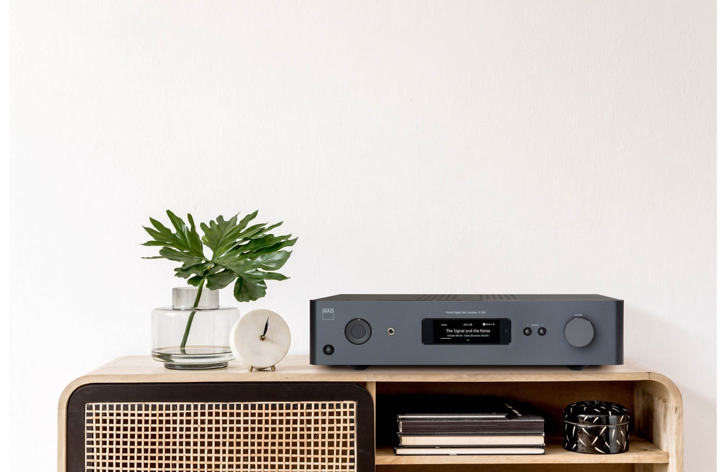 NAD C 379 stereo amplifier with sleek design and control knobs, showcasing high-quality audio equipment.