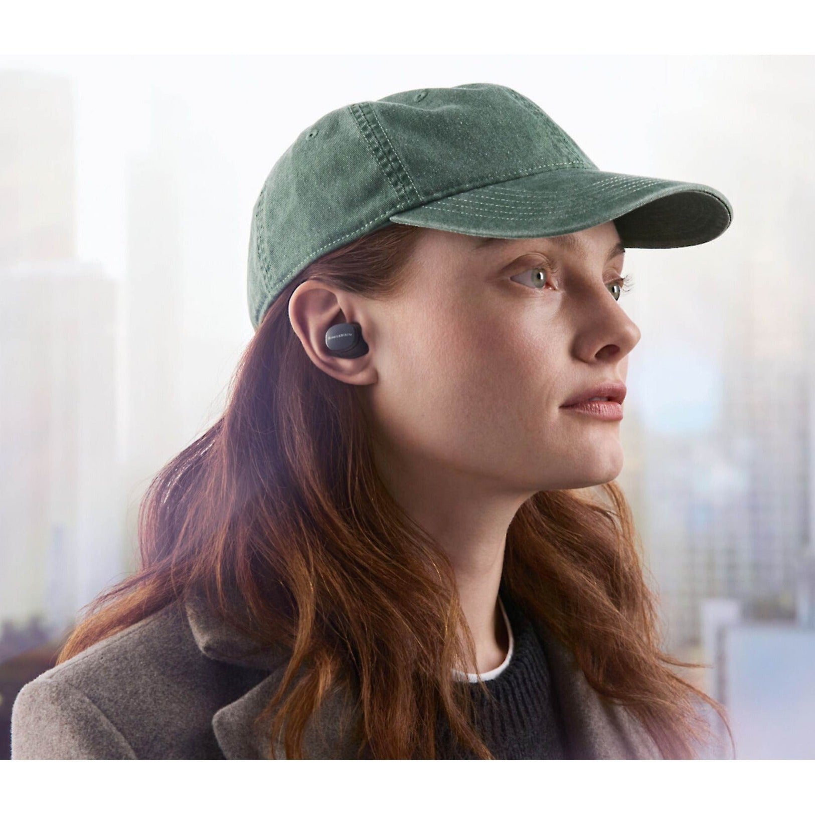 Bowers & Wilkins Pi6 wireless in-ear headphones with sleek black design and compact charging case.