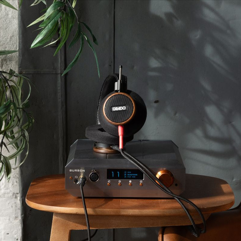 Wired Grado Signature S550 headphones with open-back design, featuring sleek black ear cups and adjustable headband.