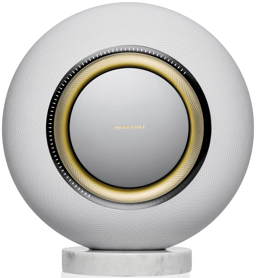 Marantz Horizon Grand wireless speakers with sleek design and modern controls, positioned on a wooden surface.