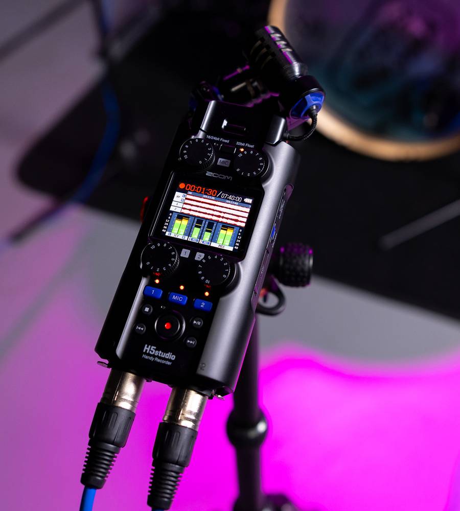 Zoom H5studio digital recorder with multiple input jacks and compact design, shown in a close-up image.