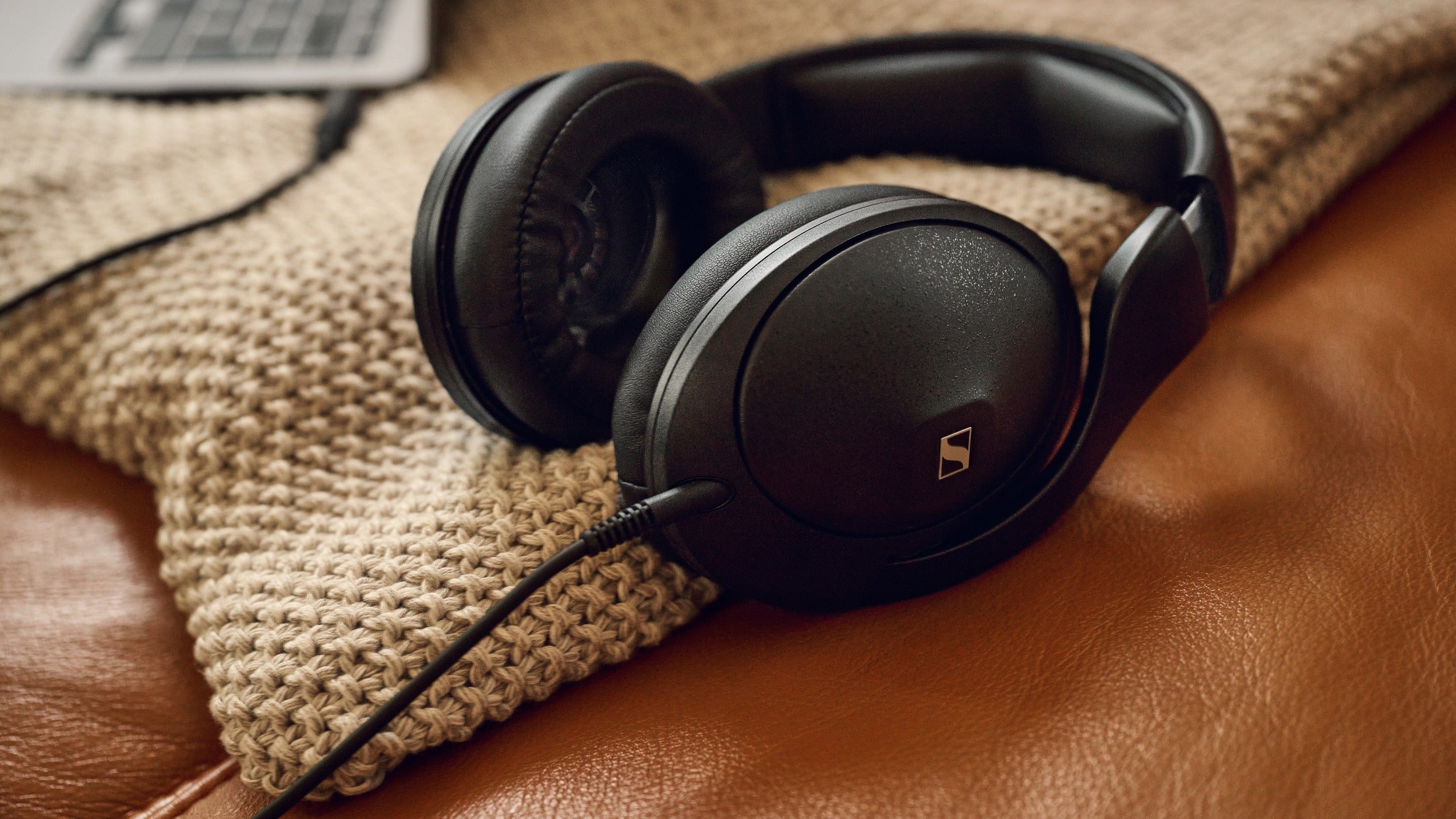 Sennheiser HD 620S headphones in black, featuring over-ear design and open-back ear cups, resting on a surface.