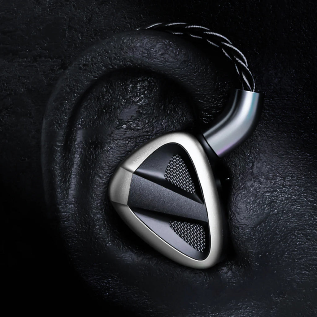 FiiO FH19 in-ear headphones with silver and black design, featuring multiple drivers and a sleek, ergonomic shape.