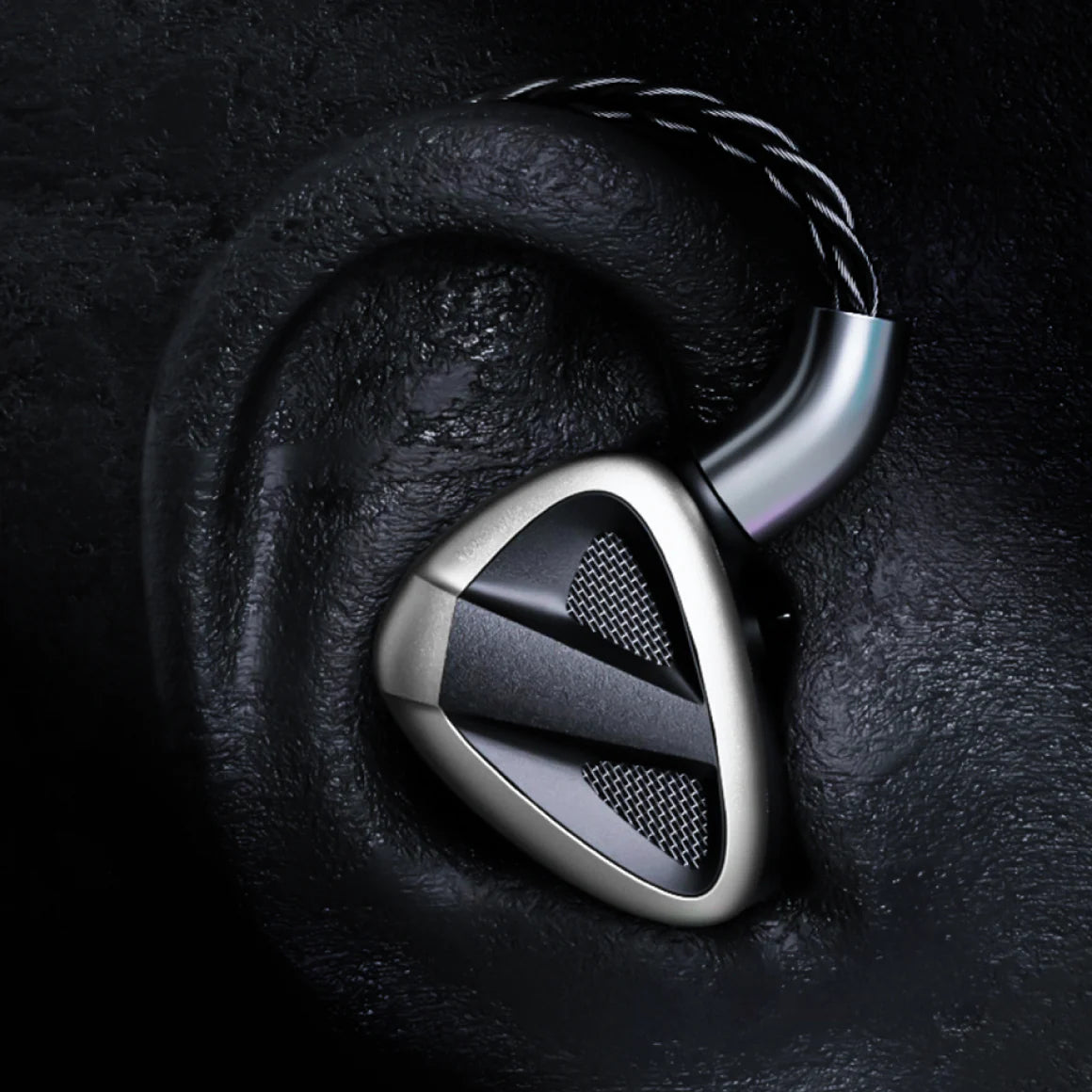 FiiO FH19 in-ear headphones with silver and black design, featuring multiple drivers and a sleek, ergonomic shape.
