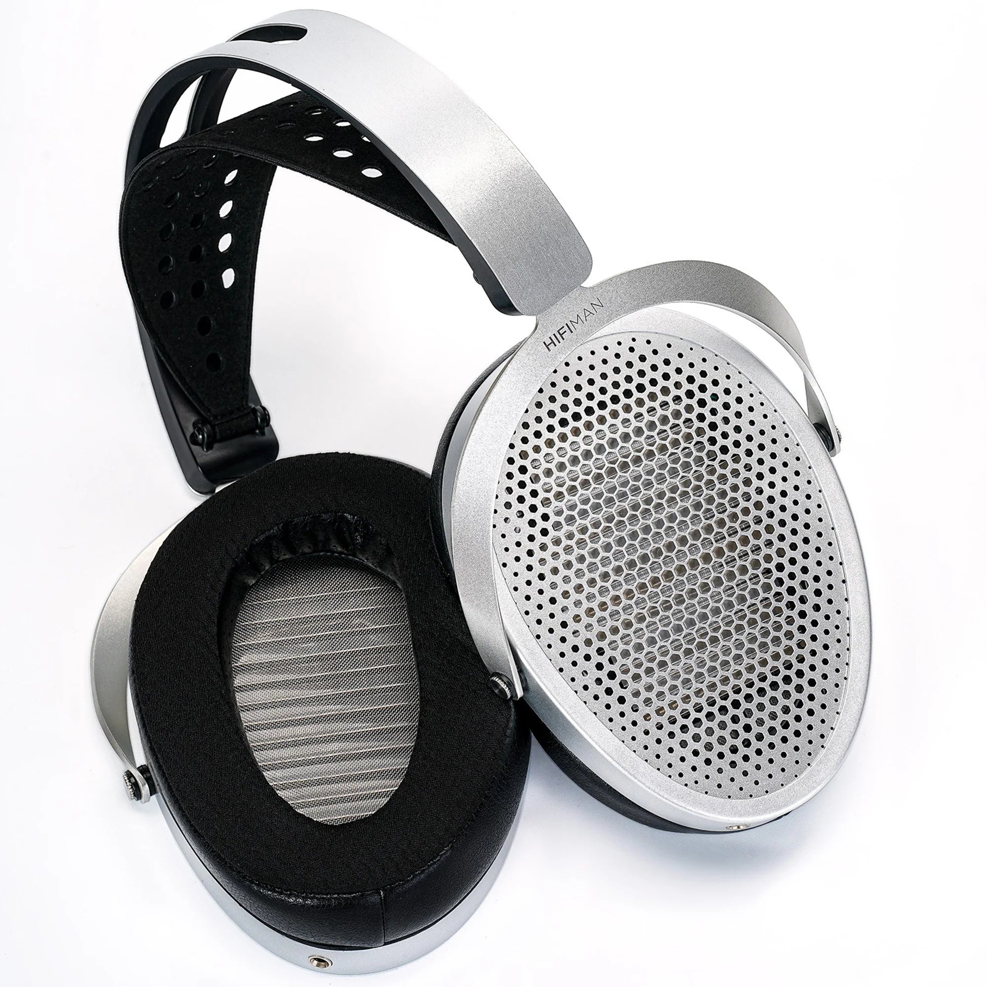 HiFiMAN Edition XV wired open-back planar magnetic headphones with black ear cups and headband, resting on a surface.