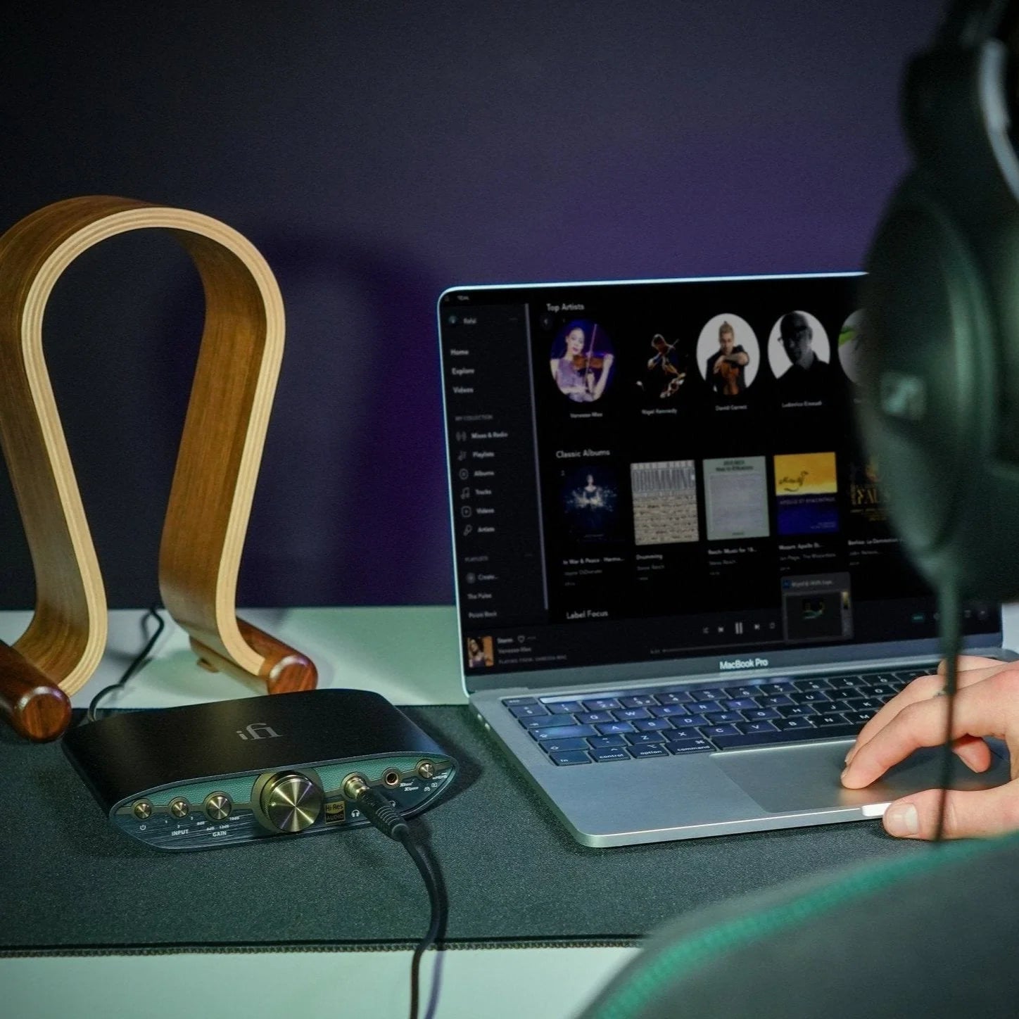 iFi Audio Zen Can 3 headphone amp / DAC, lifestyle on desk with headphone stand