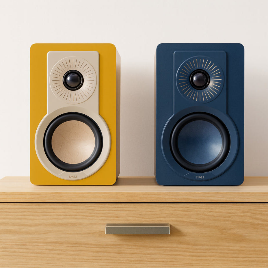 DALI Kupid passive bookshelf speakers with sleek black finish and compact design, ideal for high-quality home audio setups.