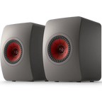 KEF LS50 Meta passive bookshelf speakers with sleek black cabinets and gold accents, designed for high-quality audio.