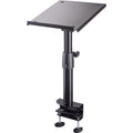 K&M 26778 studio monitor stands supporting speakers with adjustable height and sturdy metal construction.