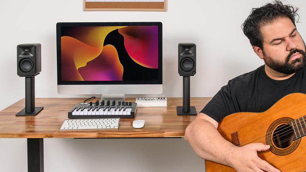 Kanto Audio Ora desktop speakers, lifestyle setup in black