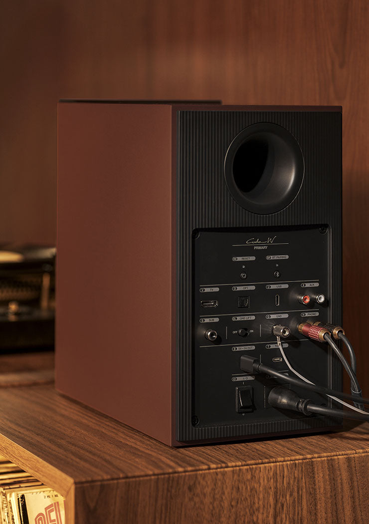 KEF Coda W active bookshelf speakers, lifestyle.
