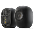 KEF LS Luxe wireless speakers in Eclipse Black, front and rear view of the pair