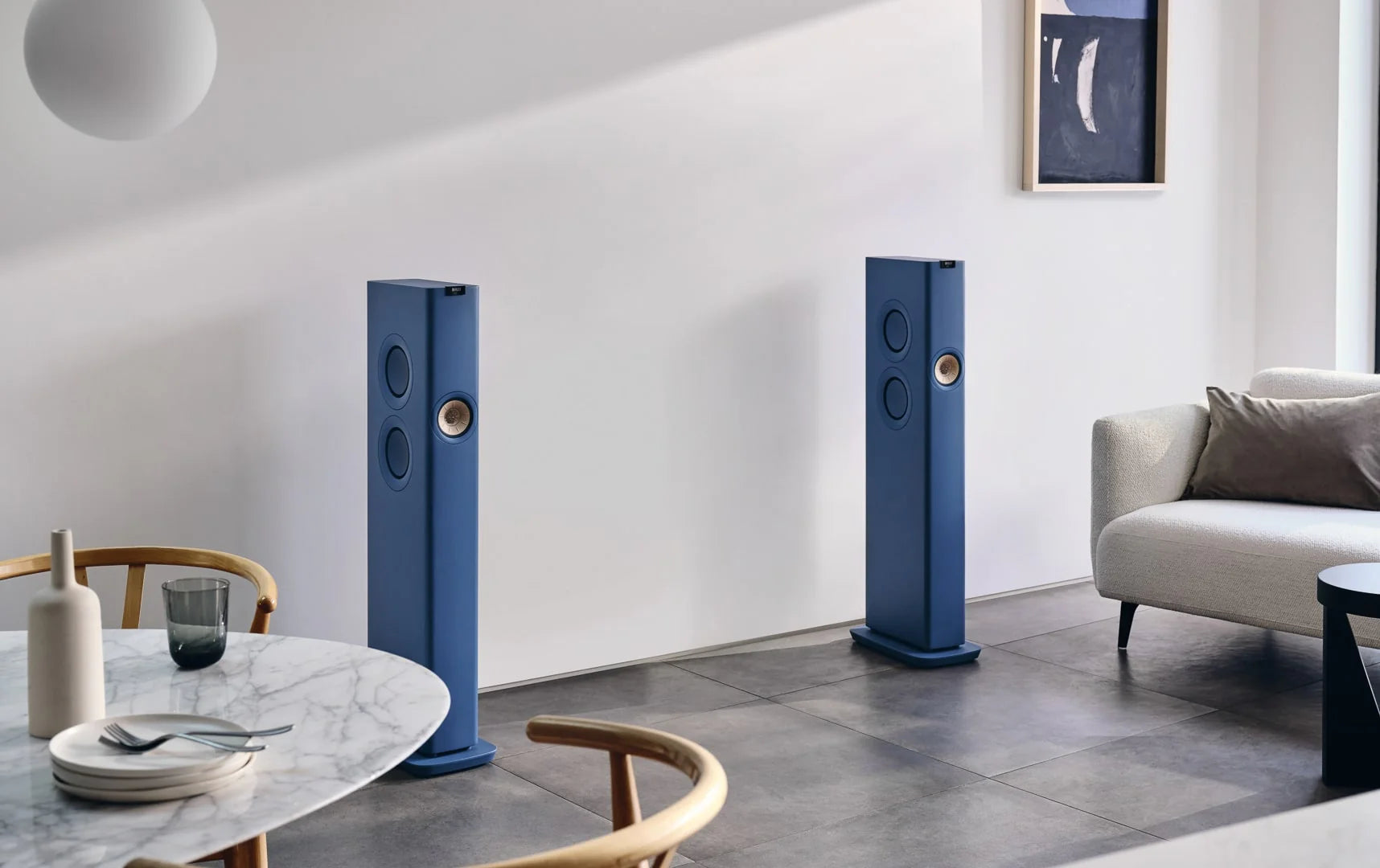 KEF LS60 Wireless floorstanding speakers with sleek black finish and modern design, showcasing their stylish appearance.