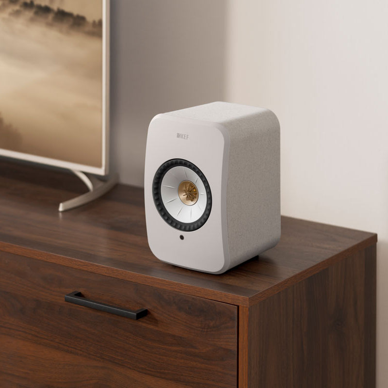 KEF LSX II wireless bookshelf speakers, in amber haze and cotton white