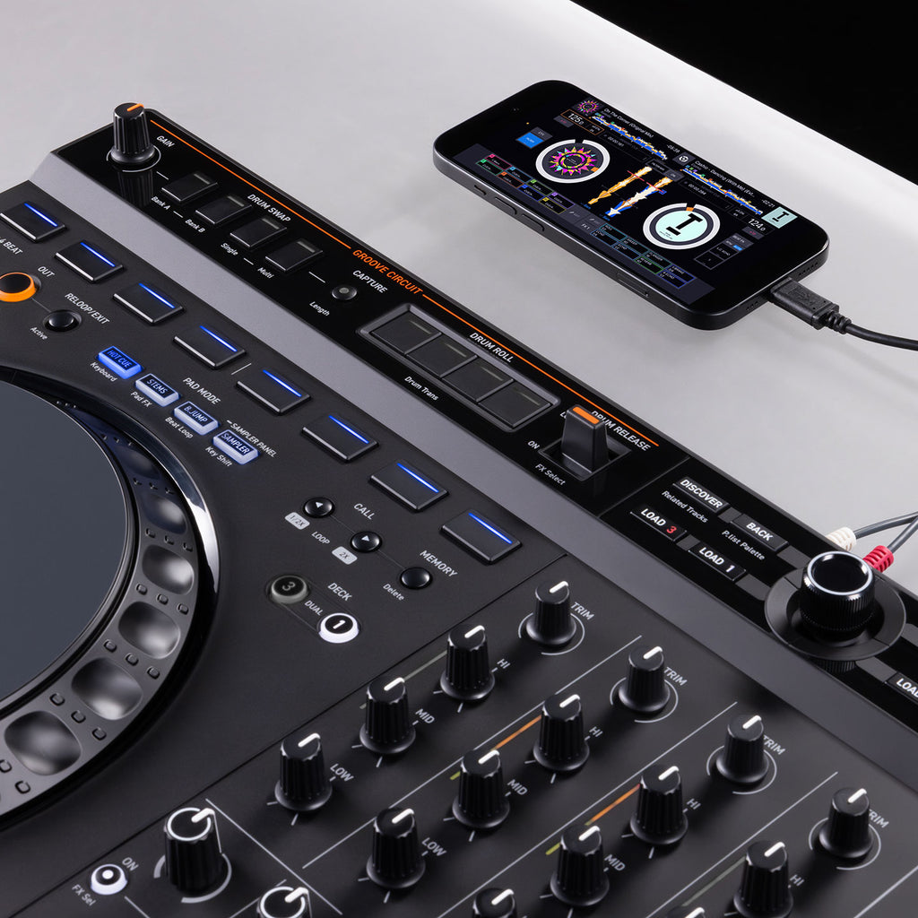 AlphaTheta DDJ-GRV6 DJ controller with jog wheels, mixer controls, and performance pads on the right side.