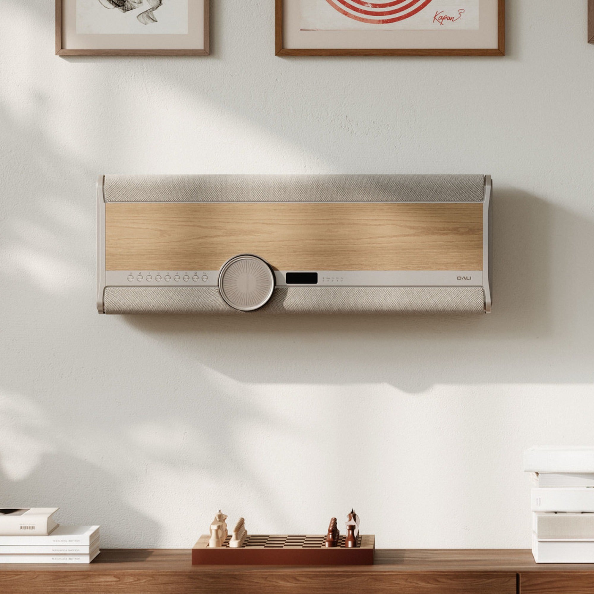 Dali Vega wall-mounted in a living room, Natural Oak finish