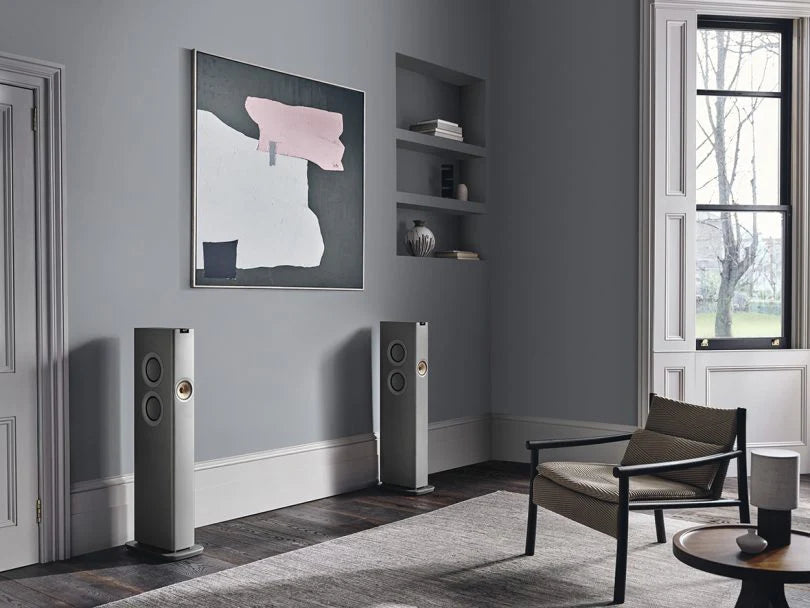 KEF LS60 Wireless floorstanding speakers in titanium grey with sleek modern design, showcasing their elegant speaker cabinets.