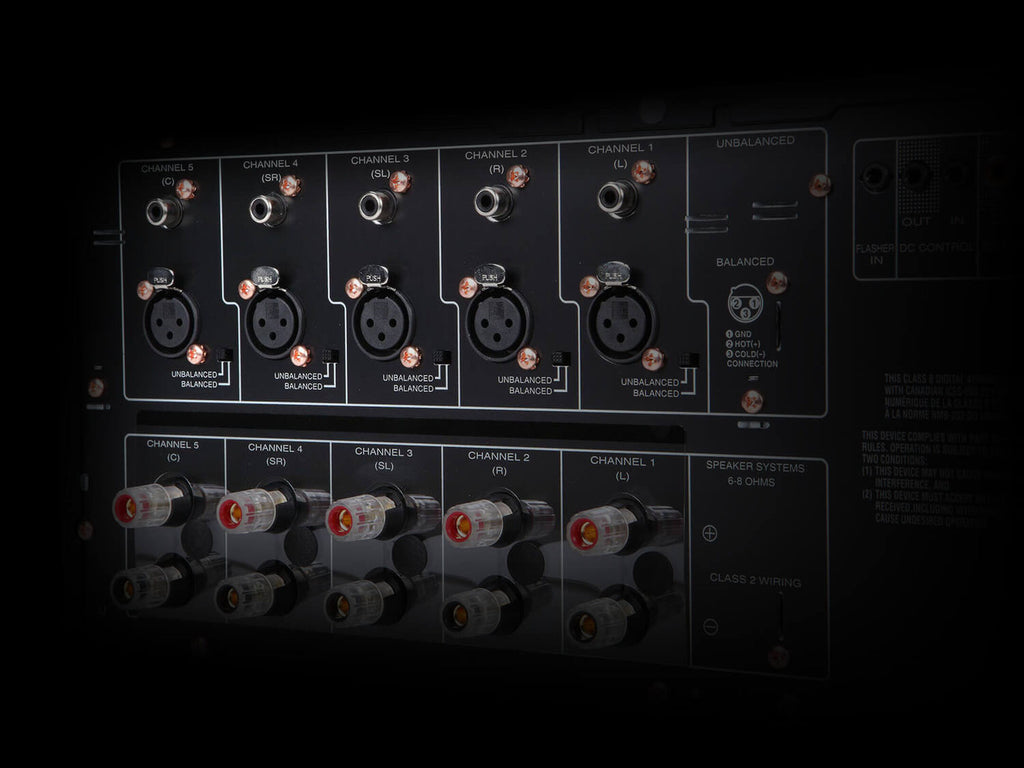 Marantz MM7055 stereo amplifier with multiple input options and sleek black design, showcasing its front panel controls.