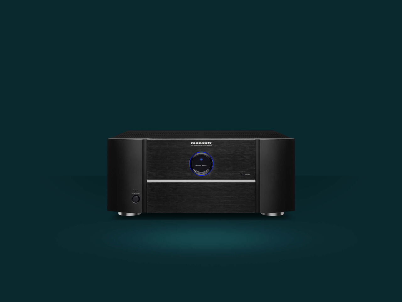 Marantz MM7055 stereo amplifier with sleek design and multiple audio input options, ideal for high-quality home audio systems.