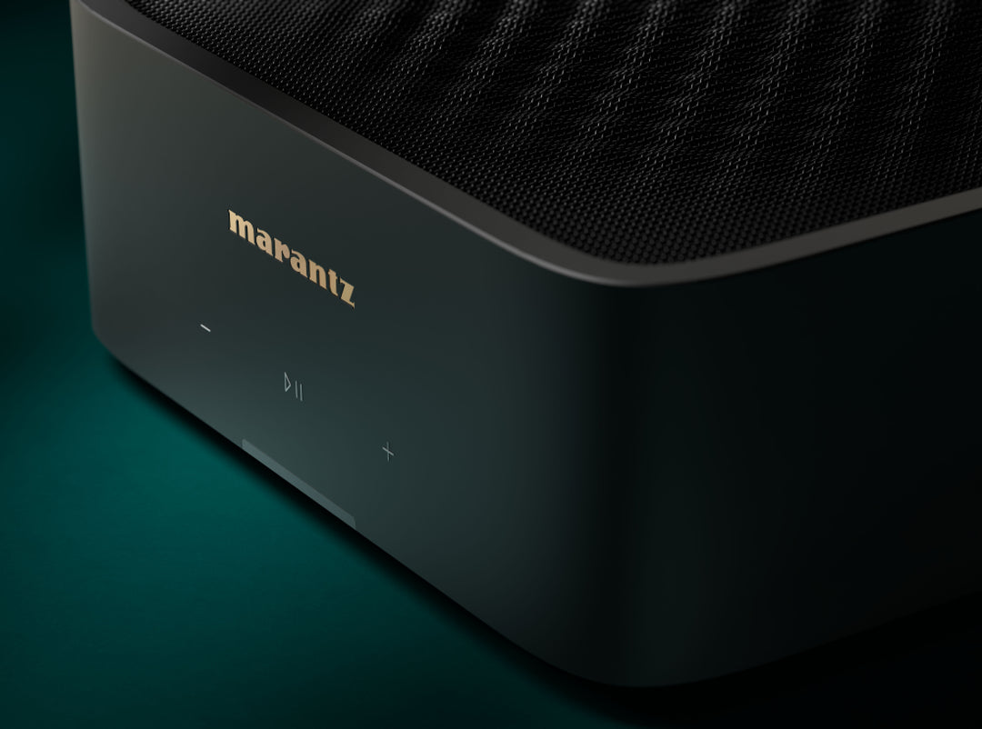 Marantz MODEL M1 music streamer with a sleek black design, featuring front display and control buttons.