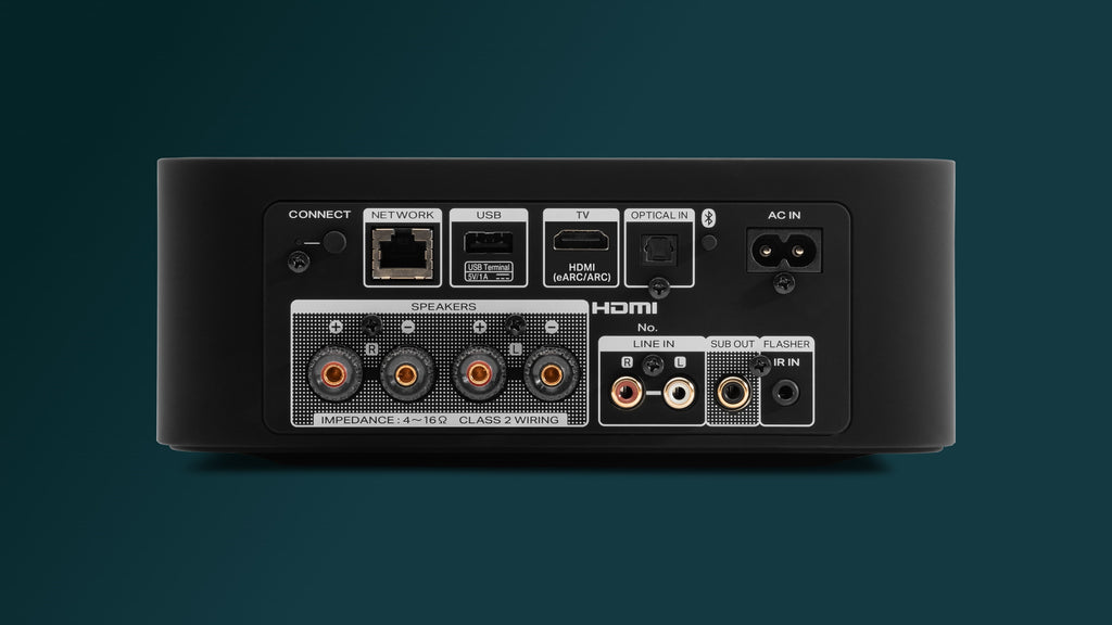 Marantz MODEL M1 music streamer connected to desktop with setup helper interface visible in the image.