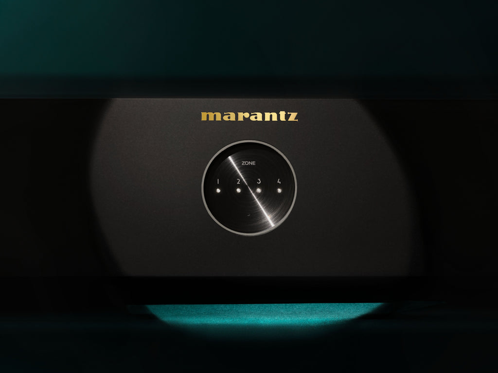 Marantz MODEL M4 stereo amplifier with multiple views showing front panel controls and sleek design.