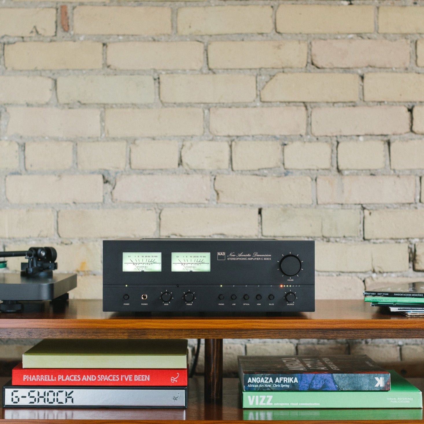 NAD C 3030S stereo amplifier with sleek black design and control knobs, showcasing high-quality audio equipment.