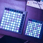 Novation FLpad, next to the FLpad Mini on a studio desk