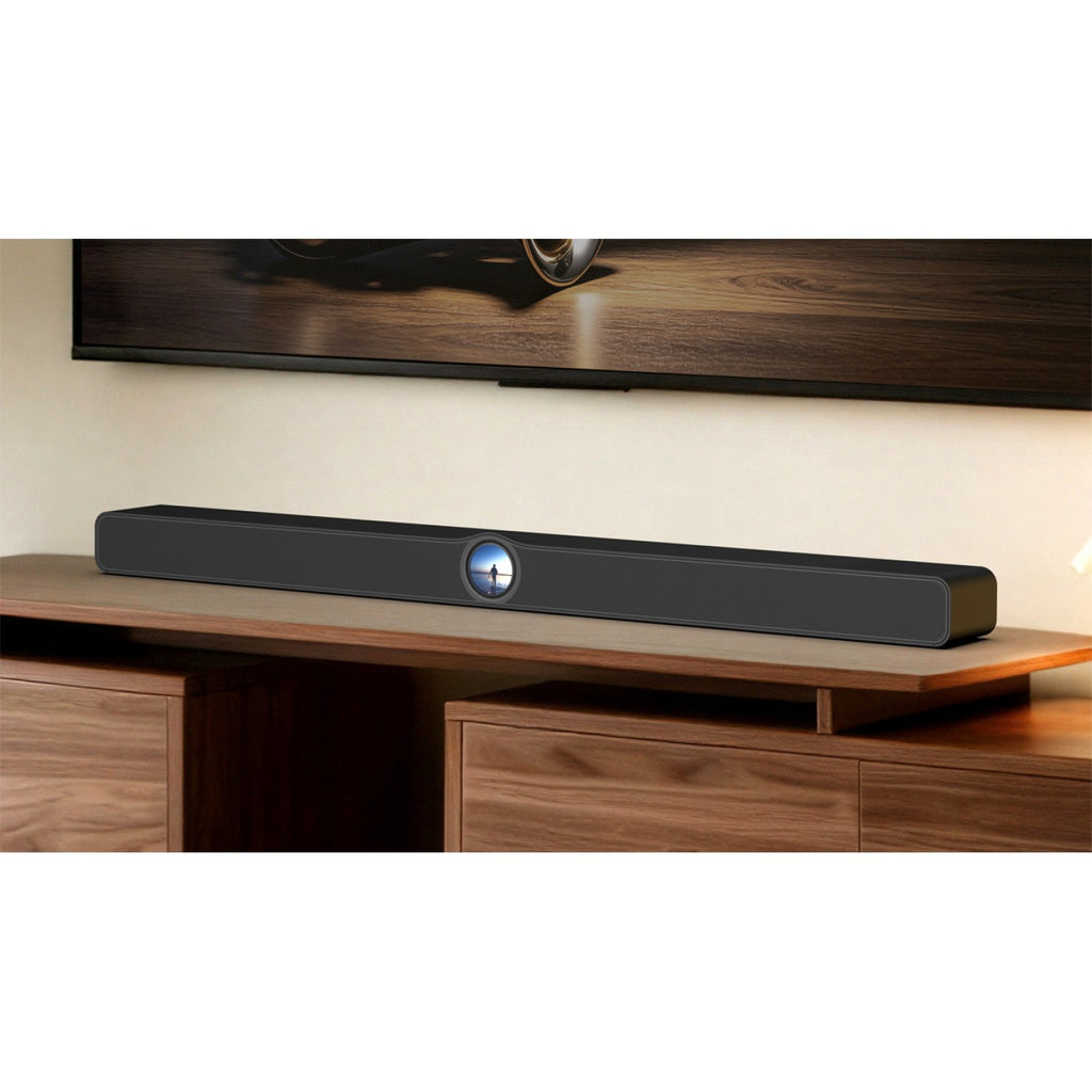 WiiM Bar Black on a media console below a TV
