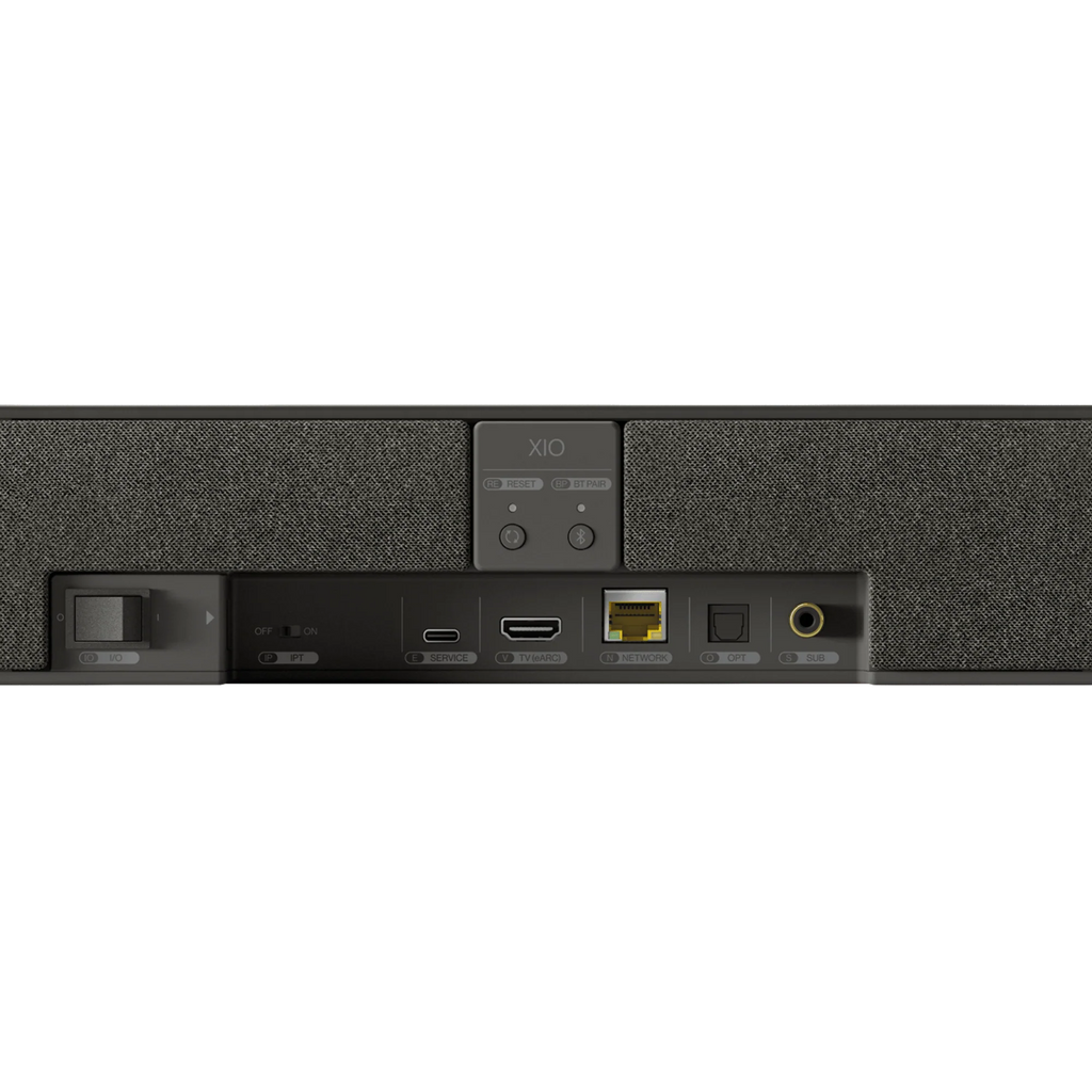 KEF XIO soundbar with sleek black design and built-in subwoofer for immersive TV audio.