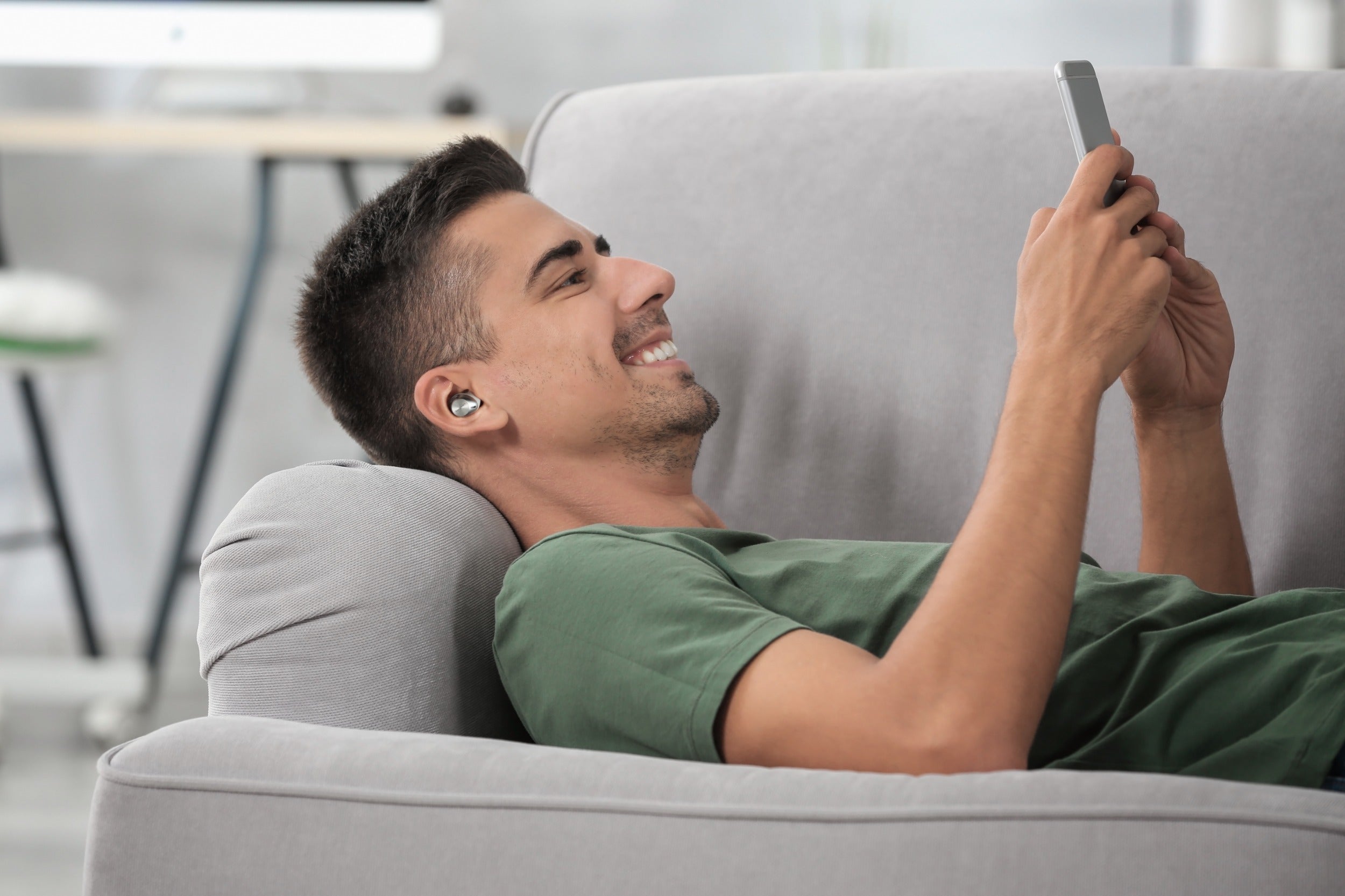 Wireless in-ear headphones by Technics EAH-AZ40M2 with sleek design and in-ear earbuds, shown in a close-up image.