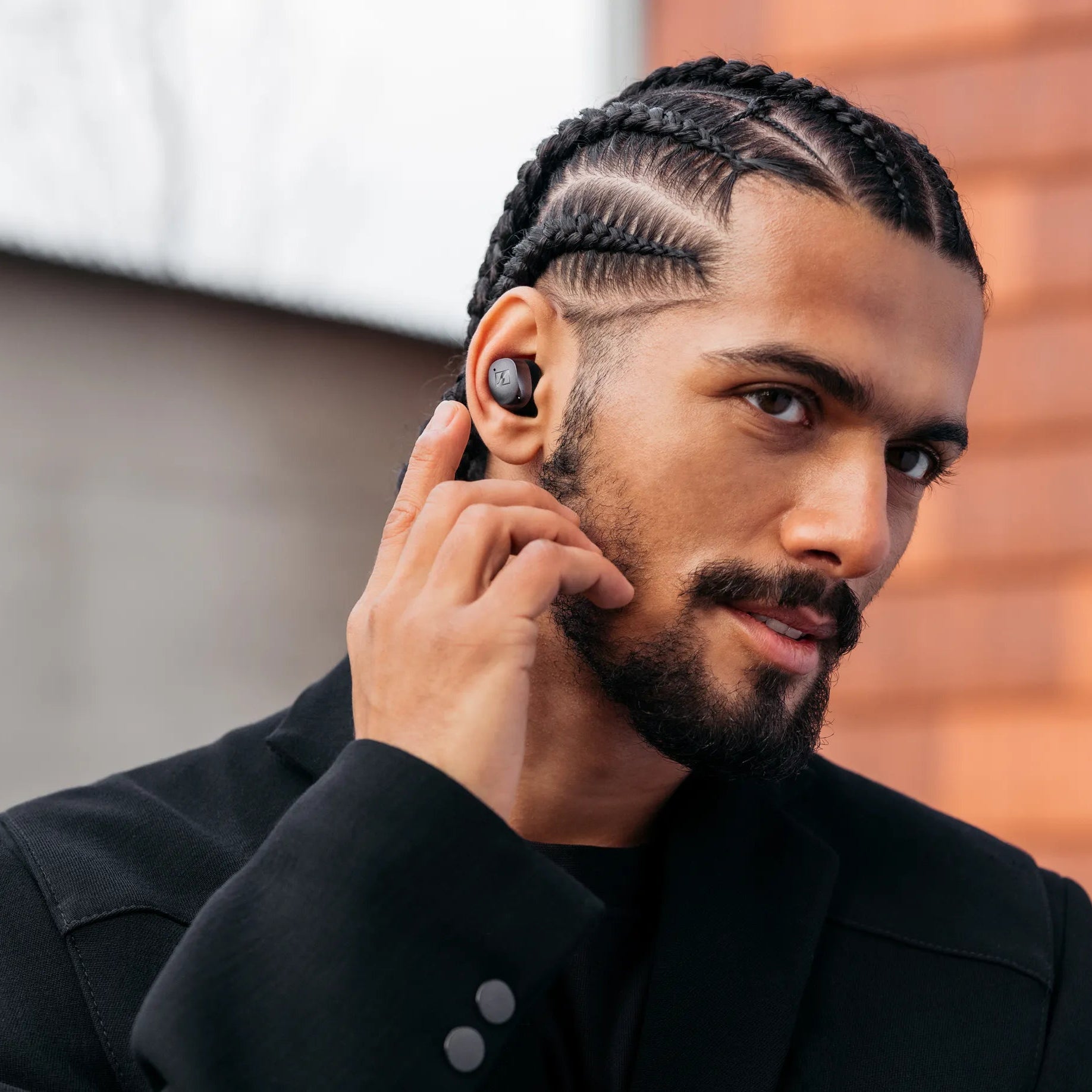 Sennheiser Momentum True Wireless 4 earphones, black, lifestyle
