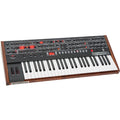 Sequential Prophet-6 synthesizer with knobs, switches, and keyboard, showcasing its professional-grade design and controls.