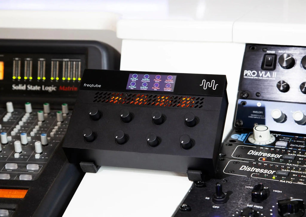 Freqport FreqTube FT1 effects and accessories slide showing the compact effects pedal with controls and input/output jacks
