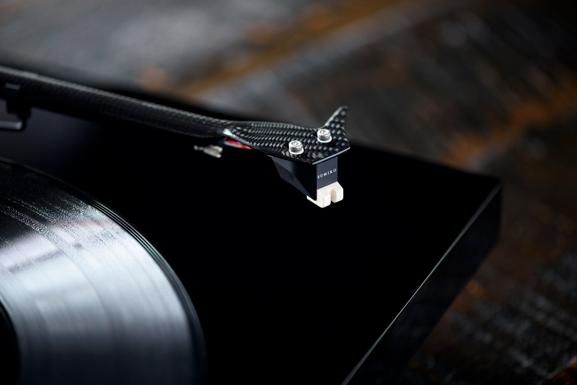 Sumiko Rainier MM phono stylus mounted on a turntable cartridge, showcasing the cartridge details for vinyl record playing.