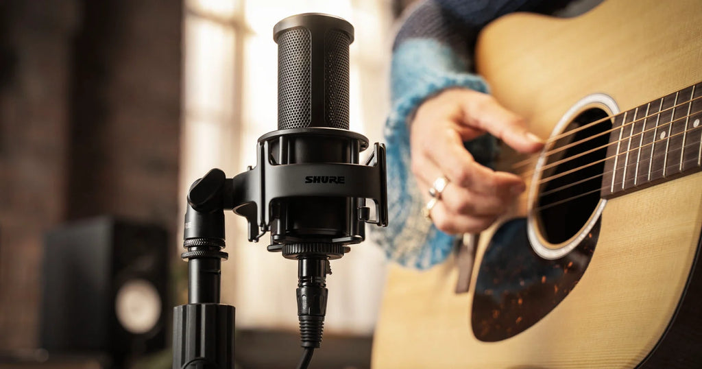 Shure SM4 condenser microphone kit for high-quality music recording at home, featuring professional audio capture equipment.