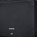 Close-up of Mackie Thump15Sv4 active subwoofer showing its rugged speaker grille and control panel for powerful bass output.