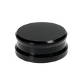 Black Tonar record weight stabilizer with 45 adaptor for vinyl records, enhances sound quality and reduces vibrations.