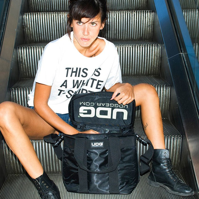 UDG StarterBag Black U9500 featuring multiple compartments for DJs, sturdy design, and comfortable shoulder straps.